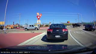 Appleton Roundabout Idiots: Black Truck Can't Read the signs.