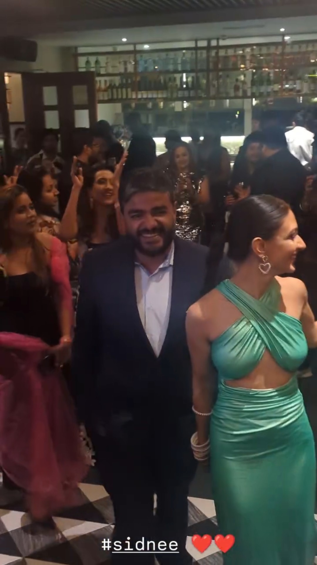 Priyanka Chopra's brother Siddharth makes a GRAND entry with wife Neelam at their wedding party ?