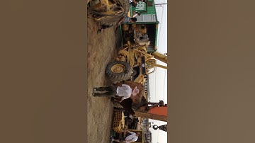 Put CAT 140H Motor Grader into 40HQ container