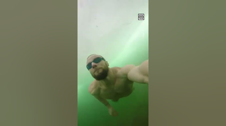 Man Swims Under Frozen Lake for 20 Meters 😮 #Shorts