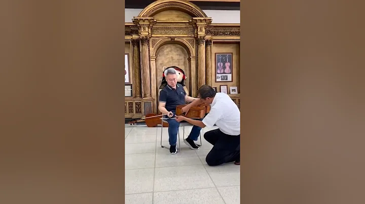 Jian Wang testing, comparing great Cellos. Storioni