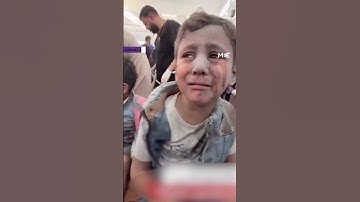 Wounded brothers in Gaza Hospital cry out for their parents after an Israeli attack on their home