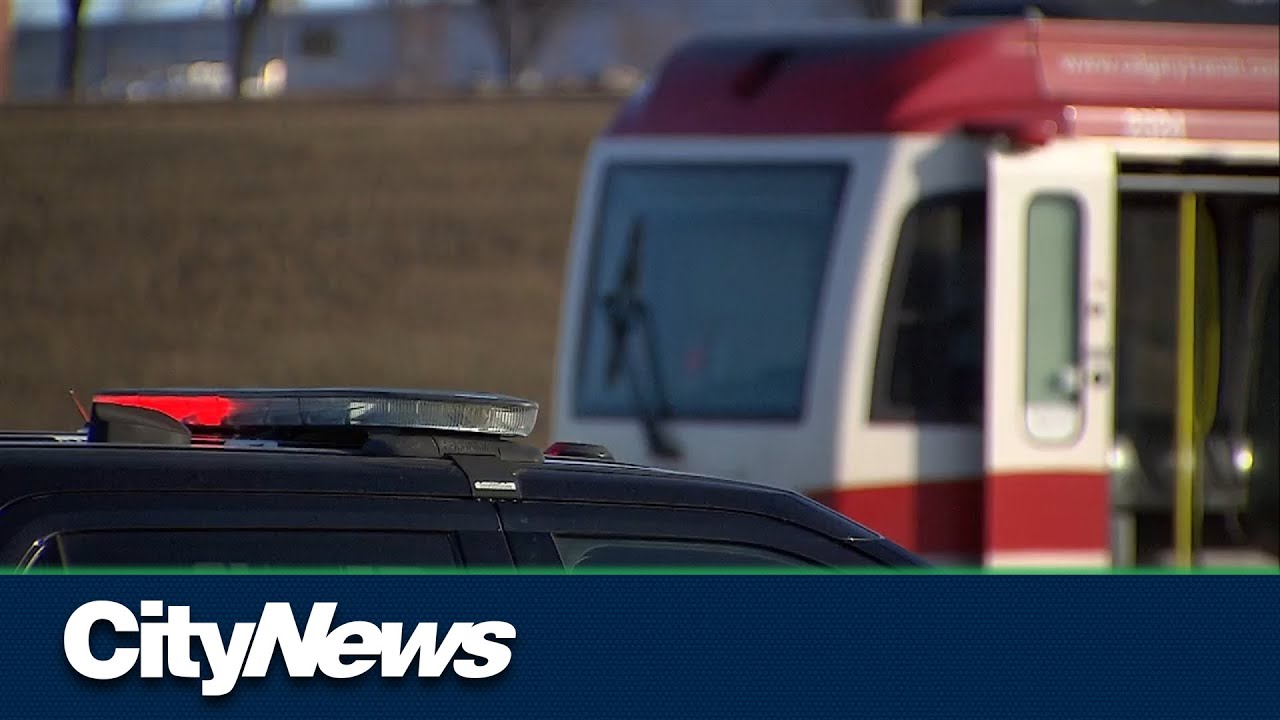 Man killed after vehicle crashes with CTrain - YouTube