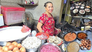 Tiệm bánh căn mực ống ở Sài Gòn, con tôm to hơn cái bánh, có luôn nhân thịt gà đông khách