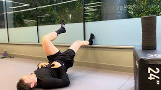 Wall Supported Hamstring Bridge Heel Raised