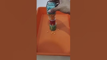 Pearls Drop From Different Glasses #shorts #asmr #pearls #satisfying #oddlysatisfying #beads #button