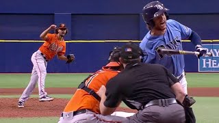 Rays' Brett Phillips fakes charging the mound after being hit by former teammate Jorge Lopez