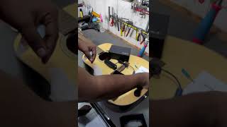 Quickest way to make your acoustic guitar into electro acoustic. Double X0 pickup!