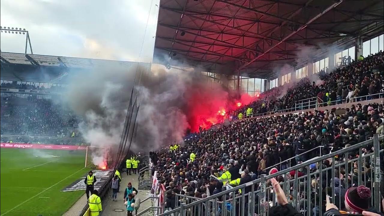 Hansa Rostock Fans eskalieren und schießen Pyro in St. Pauli Blöcke