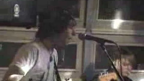 Daniel Conti and Drawing Back perform Street Corne...
