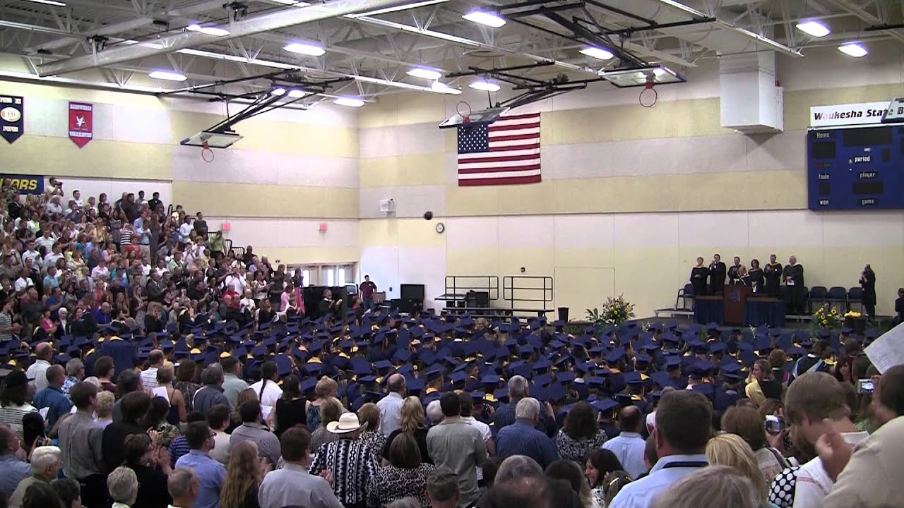 Kettle Moraine high school graduation... 2011 throwing caps Matt Hoppe