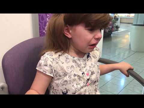 5-year-old-getting-ears-pierced-at-claire's