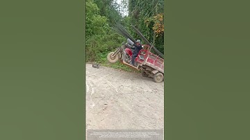 Process Of A Gasoline-Powered Tricycle Transporting Steel Bars To Climb A Slope !