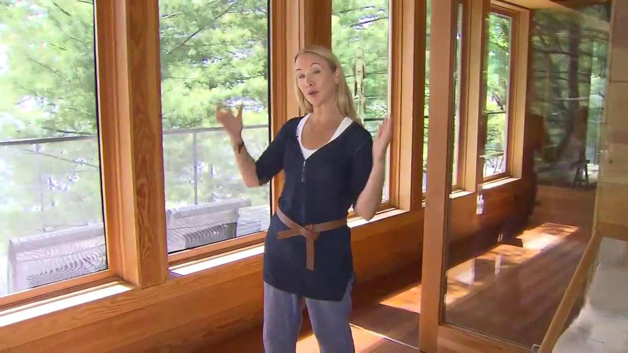 A beautiful open-concept cottage with a screened-in porch