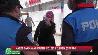 Maske Takmayan Kadin Poli̇si̇ Çi̇leden Çikardi