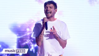 Louis Tomlinson STOPS Show For Sick Fan In Audience!