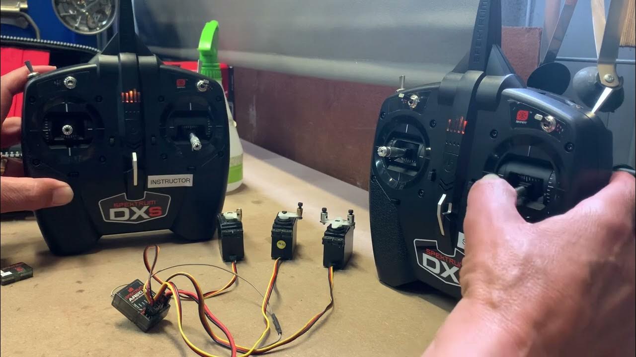 2 Spektrum DS transmitters configured as wireless Trainer and Student