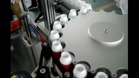 High speed round bottle labeling machine self adhesive rotary labeler plasitc jar label applicator