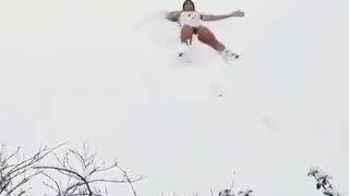 Crazy Pretty girl Swimming in the Snow