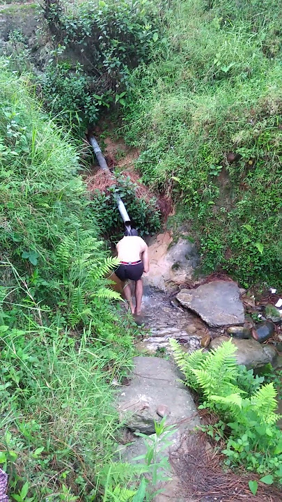 man takes bath from natural water source in mountains | himachal pradesh #shorts #viral #trending