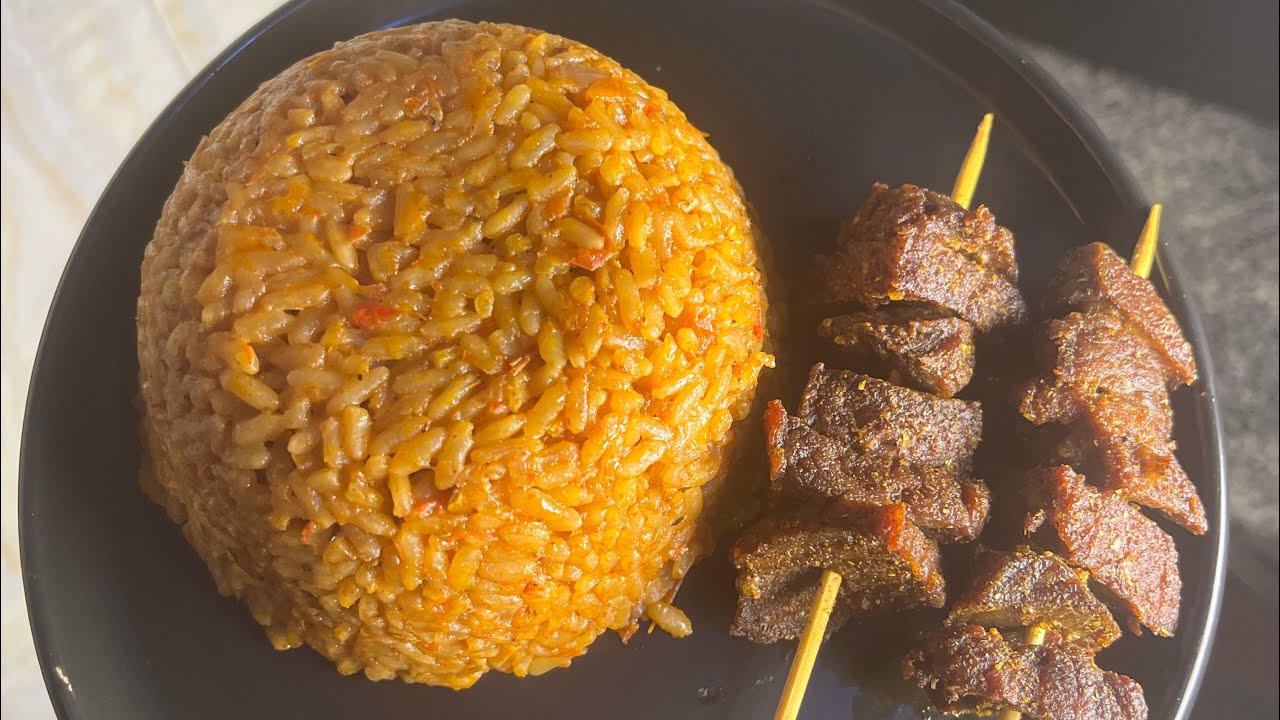Jollof Rice With Beef Kebab.  #food 