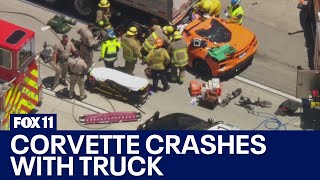 Corvette crashes into semi-truck