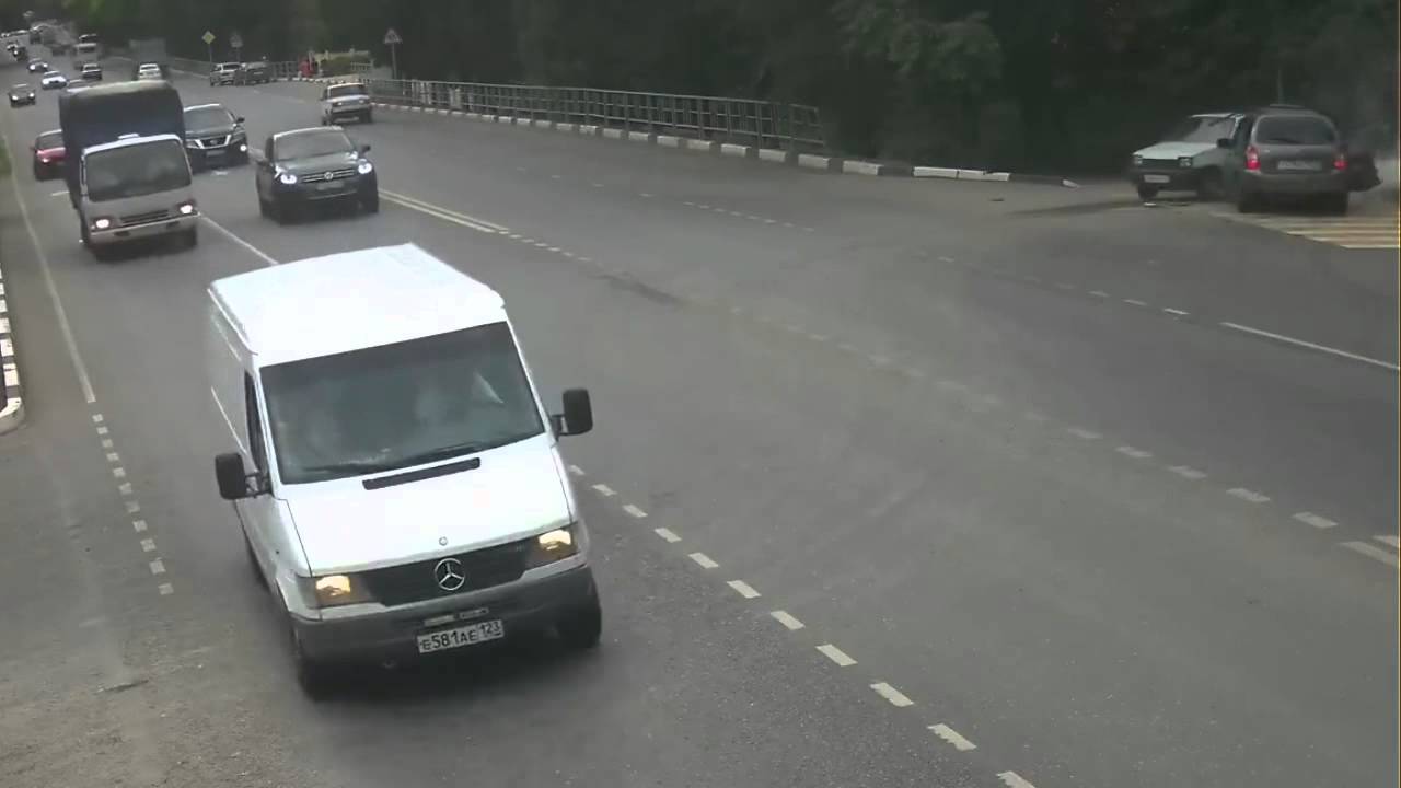 Biker crashes into turning car - YouTube