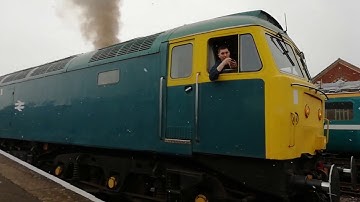 Class 47 367 leaves Dereham on the mid norfolk railway with class 33 035