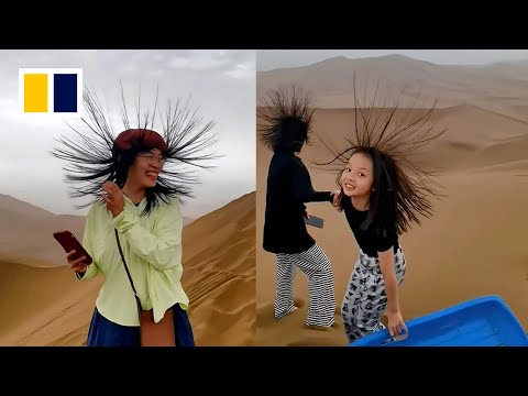 Tourists’ hair stand on end in kumtag desert