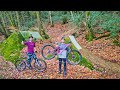 Riding backyard dirt jumps with a downhill canyon gap