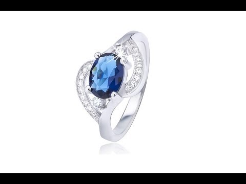 Jewellery - Silver ring with oval blue zircon, wavy arms