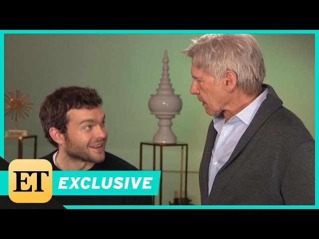 Watch Harrison Ford Surprise Young Han Solo Alden Ehrenreich During ET Interview (Exclusive) class=