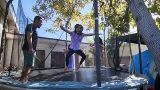 playing with my girls in a trampoline