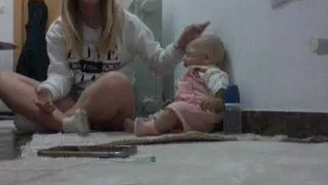 Jugando con mi bebe reborn