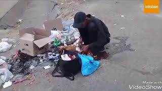 El impresionante vídeo de un mendigo que descuartiza un perro en Venezuela