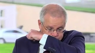 Prime Minister Scott Morrison breaks down in a coughing fit while selling the budget on live TV