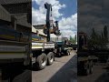 Loading forklift with a crane truck