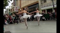 A pair of ballerinas dancing on Pacific Avenue, in Santa Cruz.