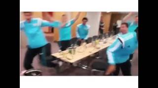 Chelsea players do a trick while seated.