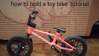 how to hold the toy bike tutorial