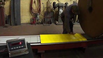 Harmax Roll Weighing System built into pull dolly track