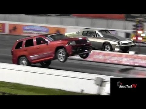 Fastest NA SRT 8 Jeep Cherokee vs Big Block Camaro  - Wheelstand - Drag Race Video -- Road Test TV