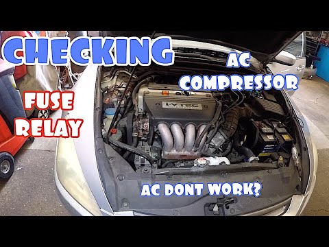 Video: Hoe weet ik of mijn AC-compressor defect is in mijn auto?