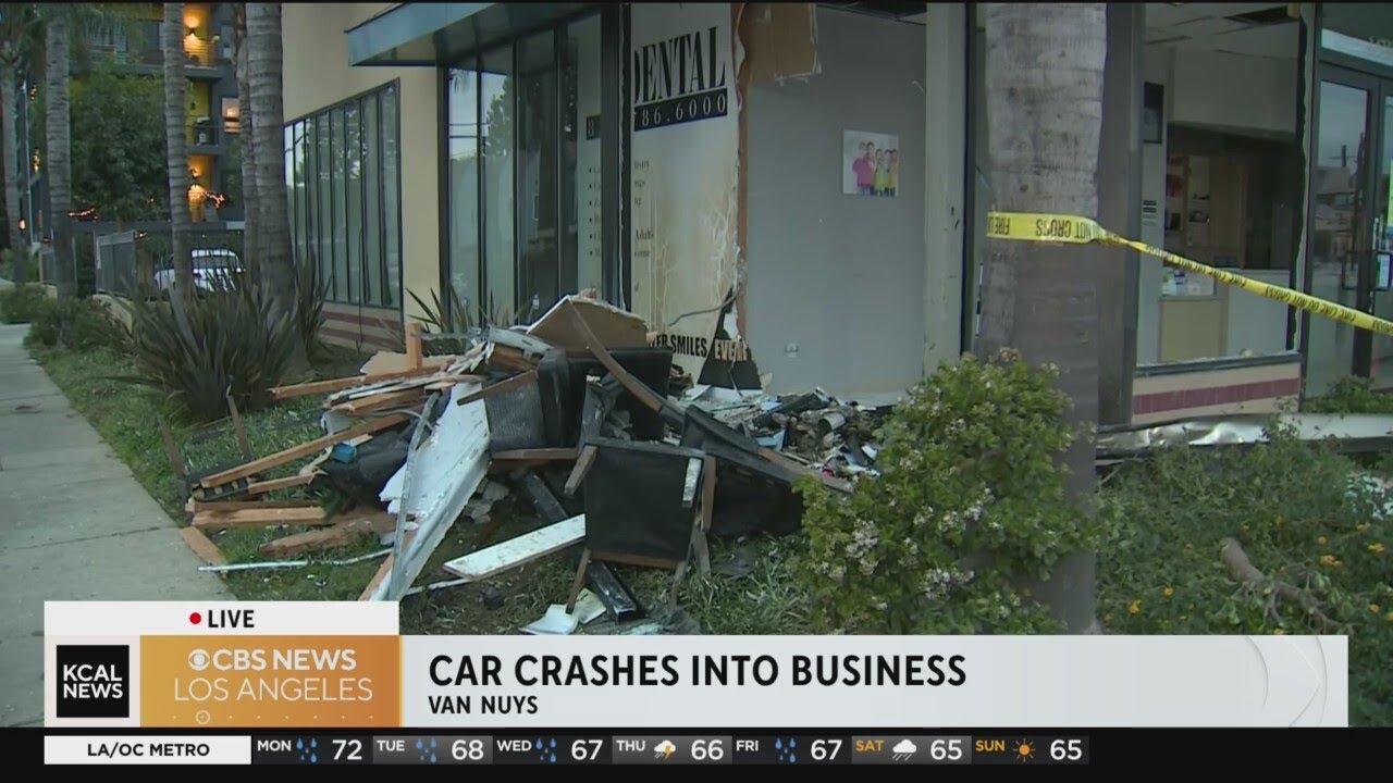 Man trapped inside car after slamming into Van Nuys business - YouTube
