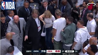 A stretcher gets brought out for a Heat fan while the rim gets repaired - #nba | Nuggets vs Heat