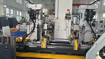 Automatic tube end chamfering and dilling machine