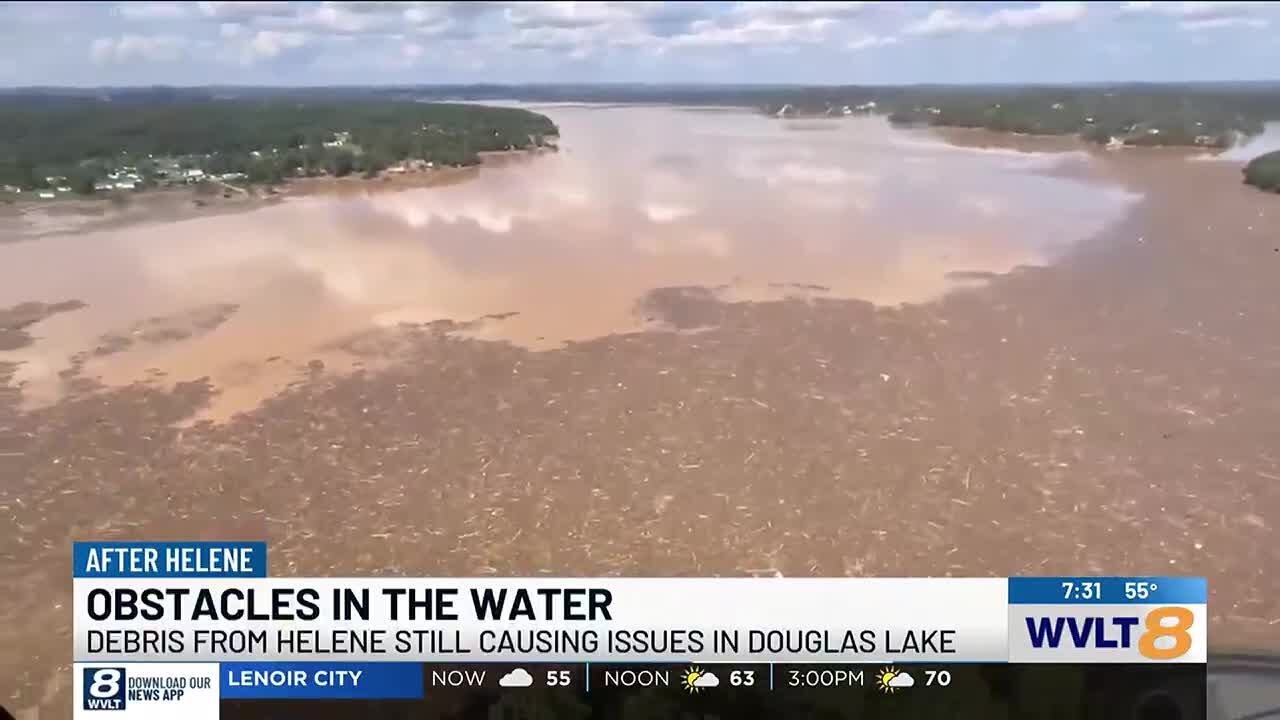 Douglas Lake marina working through debris from Helene - YouTube