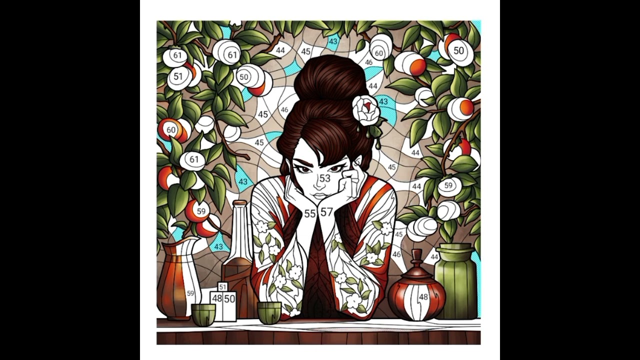 A woman sitting at a table surrounded by branches with orange fruits and green leaves 