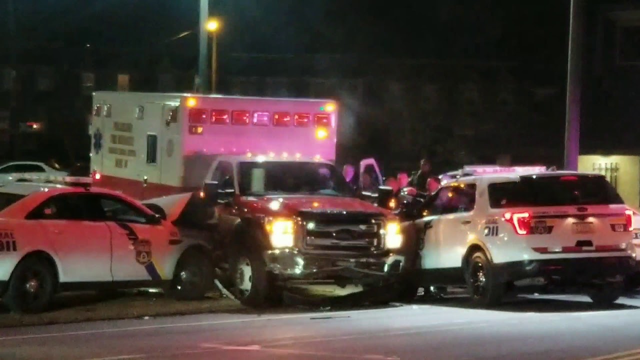 Stolen ambulance crushes police car in Philadelphia - YouTube