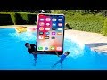 Iphone gant dans la piscine   kids pretend play with big iphone in our swimming pool